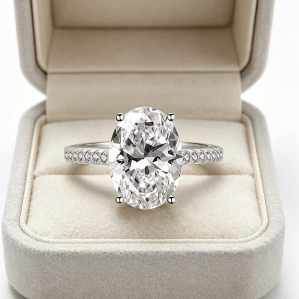 Elegant Oval Solitaire Pavé Engagement Ring